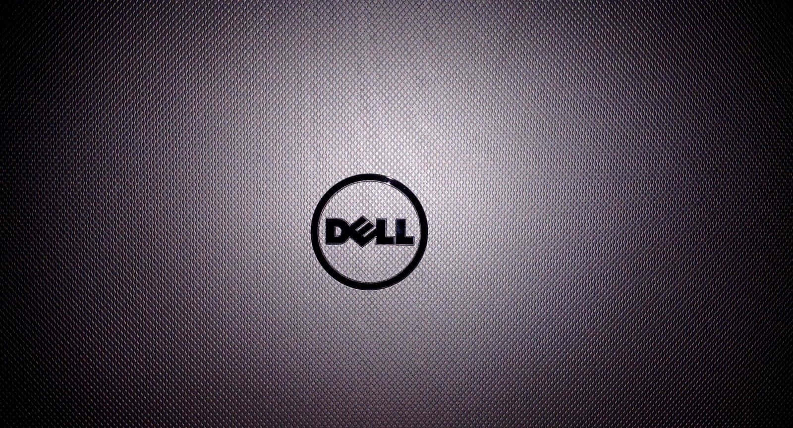 Dell 標誌在帶有紋理的灰色背景上，帶有漸變照明。