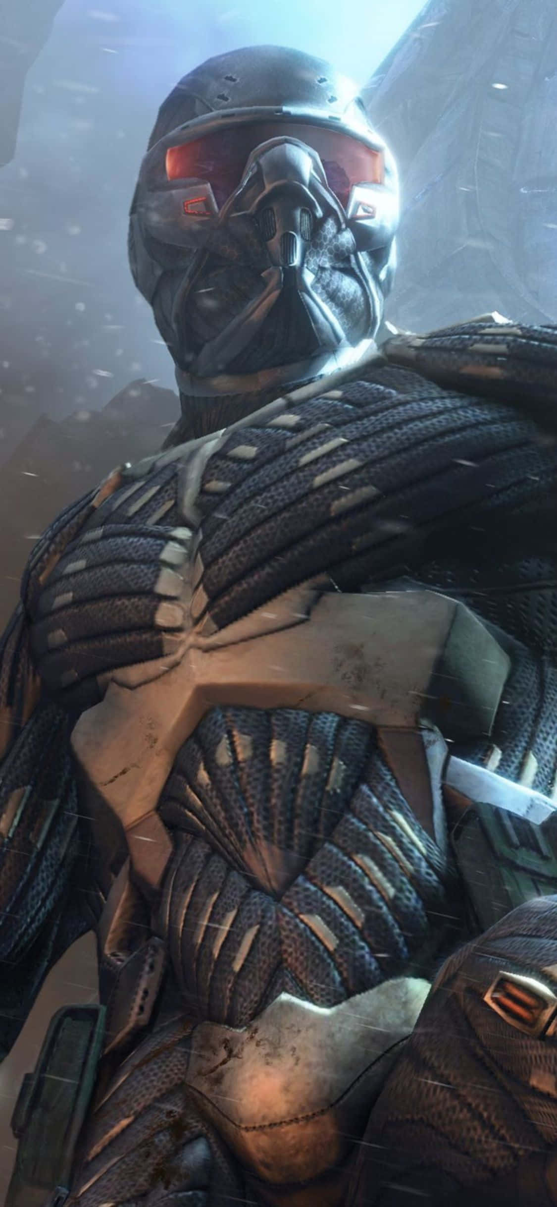 以新 iPhone X 探索 Crysis 3 的世界 壁紙 — 一個身穿盔甲、雙眼發出紅光的威嚇戰士，站在昏暗燈光下積雪覆蓋的未來廢墟中。