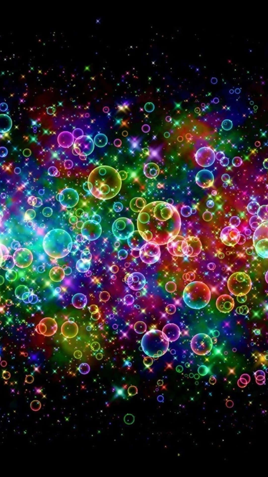 以星系彩虹點亮你的世界 壁紙 — 充滿活力的彩虹泡泡在閃爍的星星之間漂浮，背景是深邃的黑色宇宙。