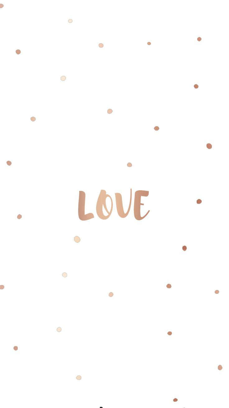 玫瑰金草書 love 字樣被散落嘅玫瑰金點點包圍喺白色背景上。