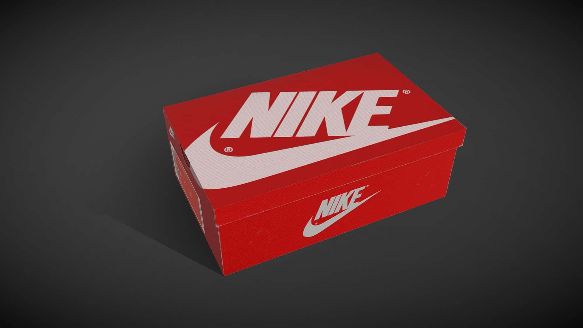 深灰色背景上帶有白色標誌的紅色Nike鞋盒。