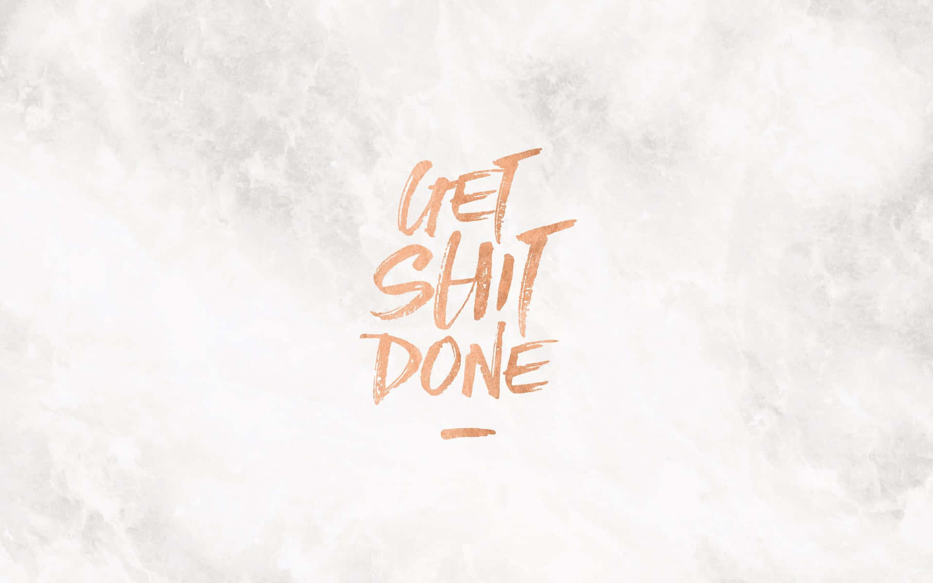 雲石紋背景上以銅色筆觸寫成嘅勵志語句 get shit done