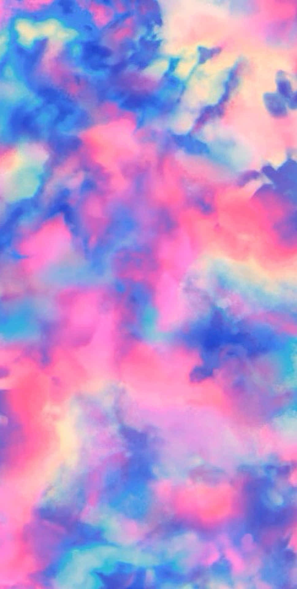 粉紅色、藍色和黃色的柔和水彩雲朵在夢幻般的天空中融合在一起。