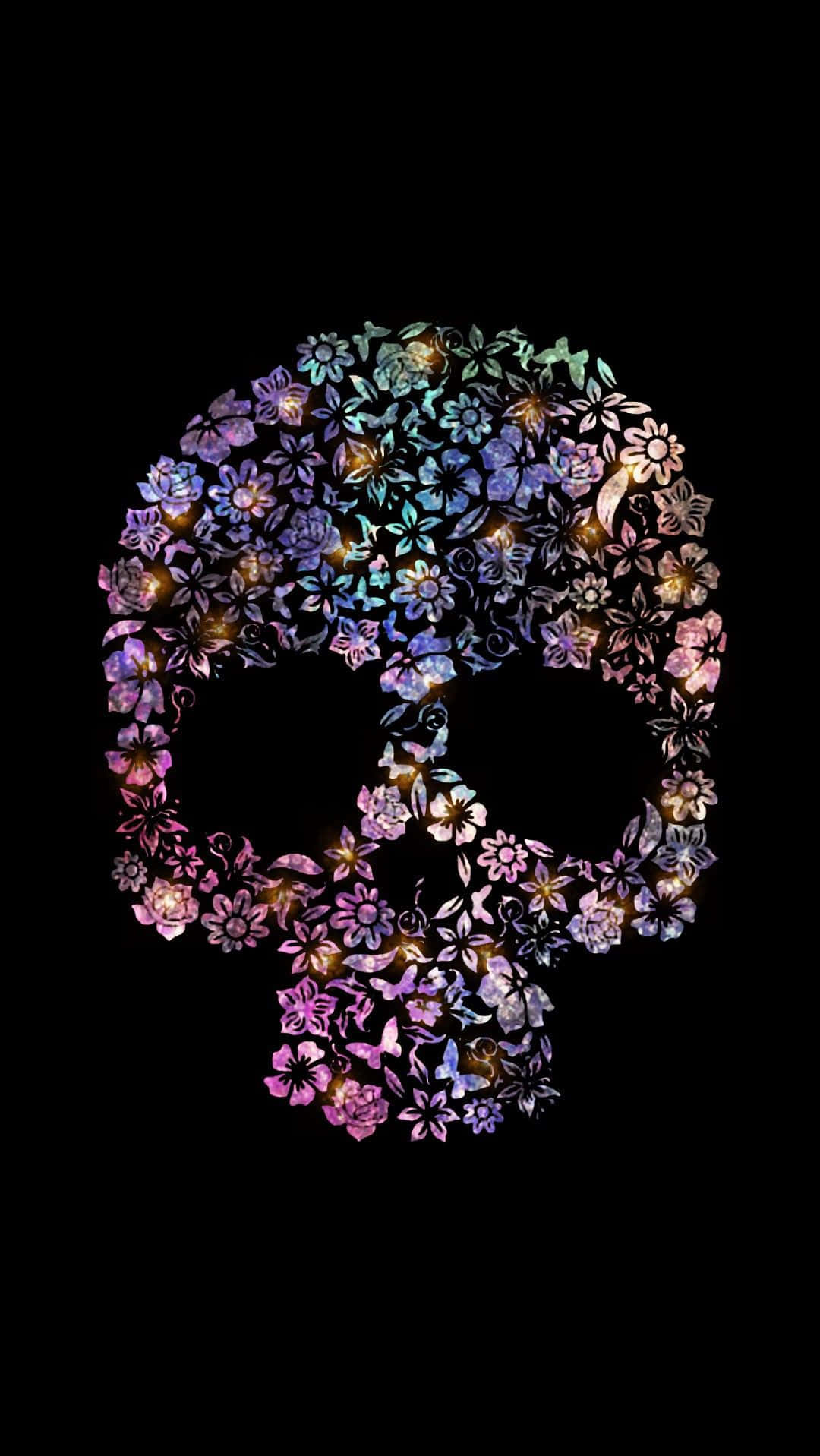 以繽紛糖骷髏慶祝生命 壁紙 — 一個由鮮豔的紫色、粉紅色和藍色花朵精緻形成的骷髏剪影，在黑色背景上發光。