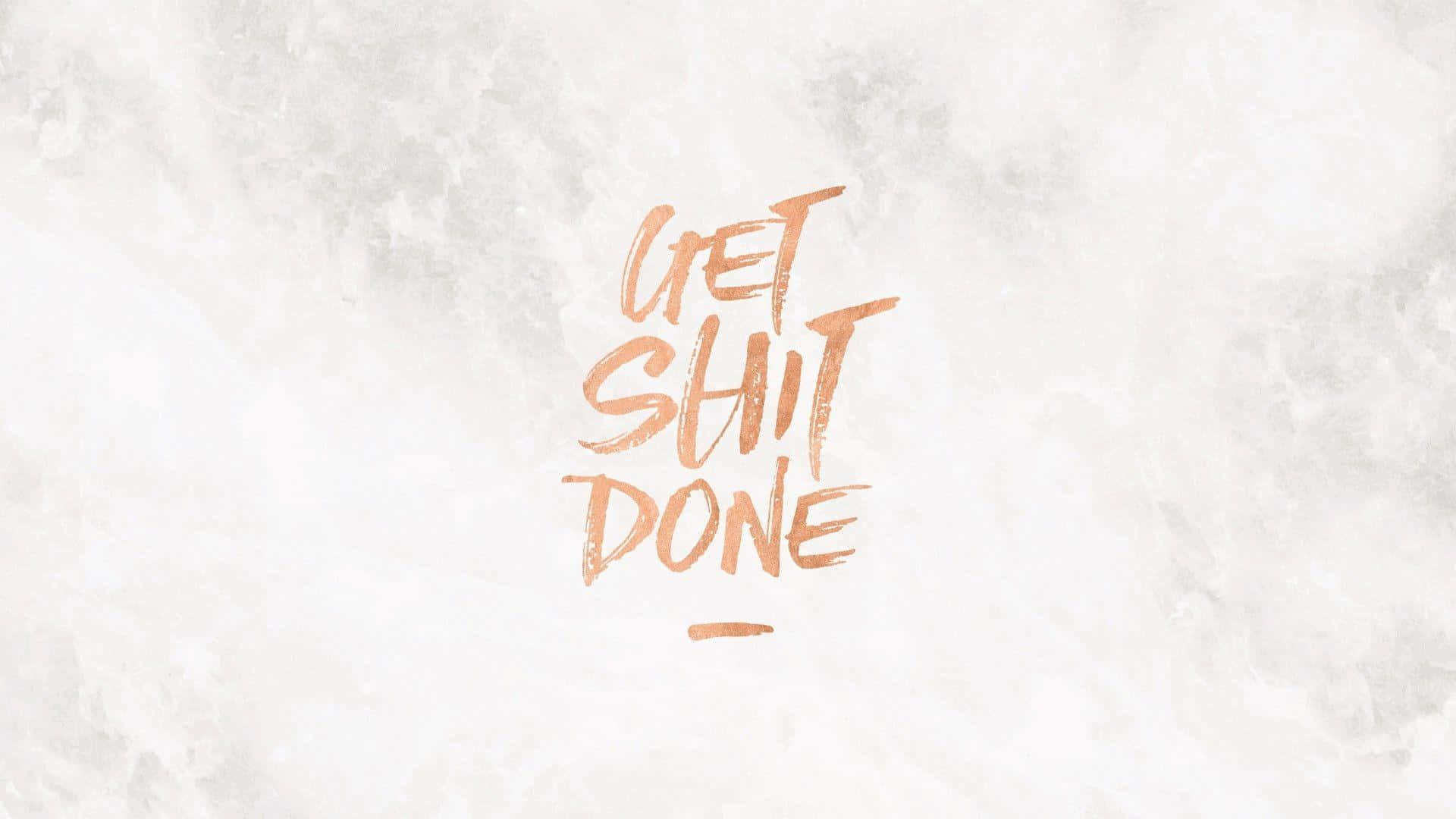 銅色筆觸字體嘅勵志語句 get shit done，配紋理背景。