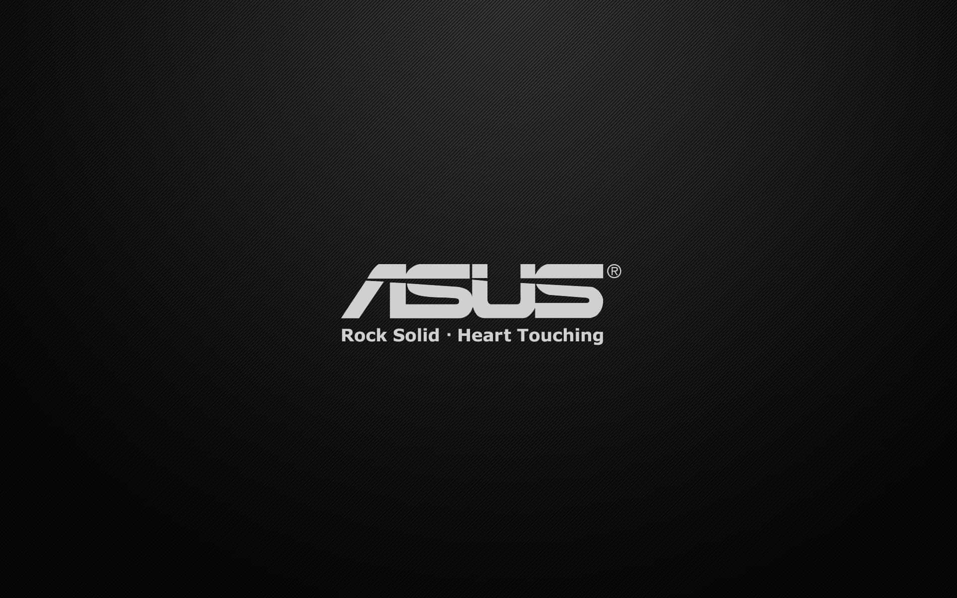 ASUS 品牌標誌，附有標語 Rock Solid Heart Touching，位於深色背景上。