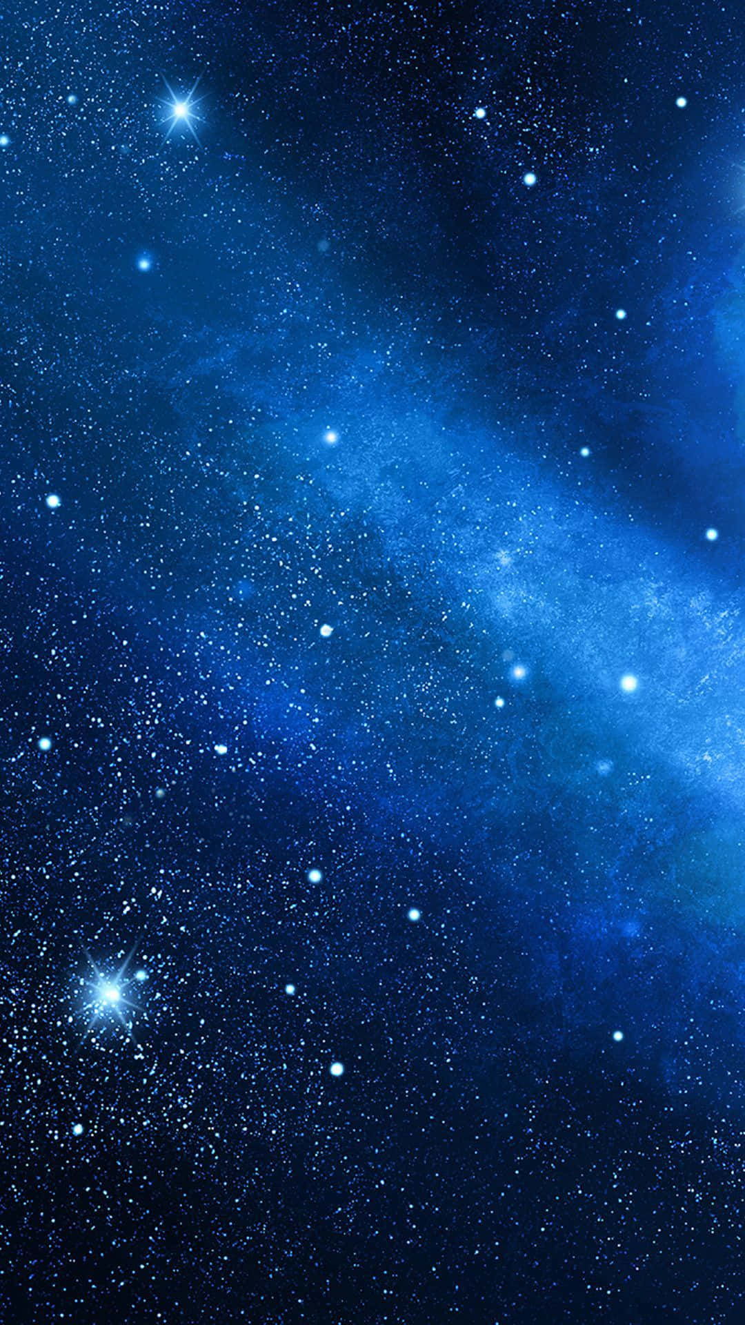 星光燦爛的夜空，帶有發光的藍色星雲和明亮的星星。