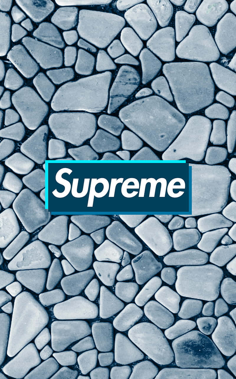 藍灰色石頭背景上的Supreme標誌