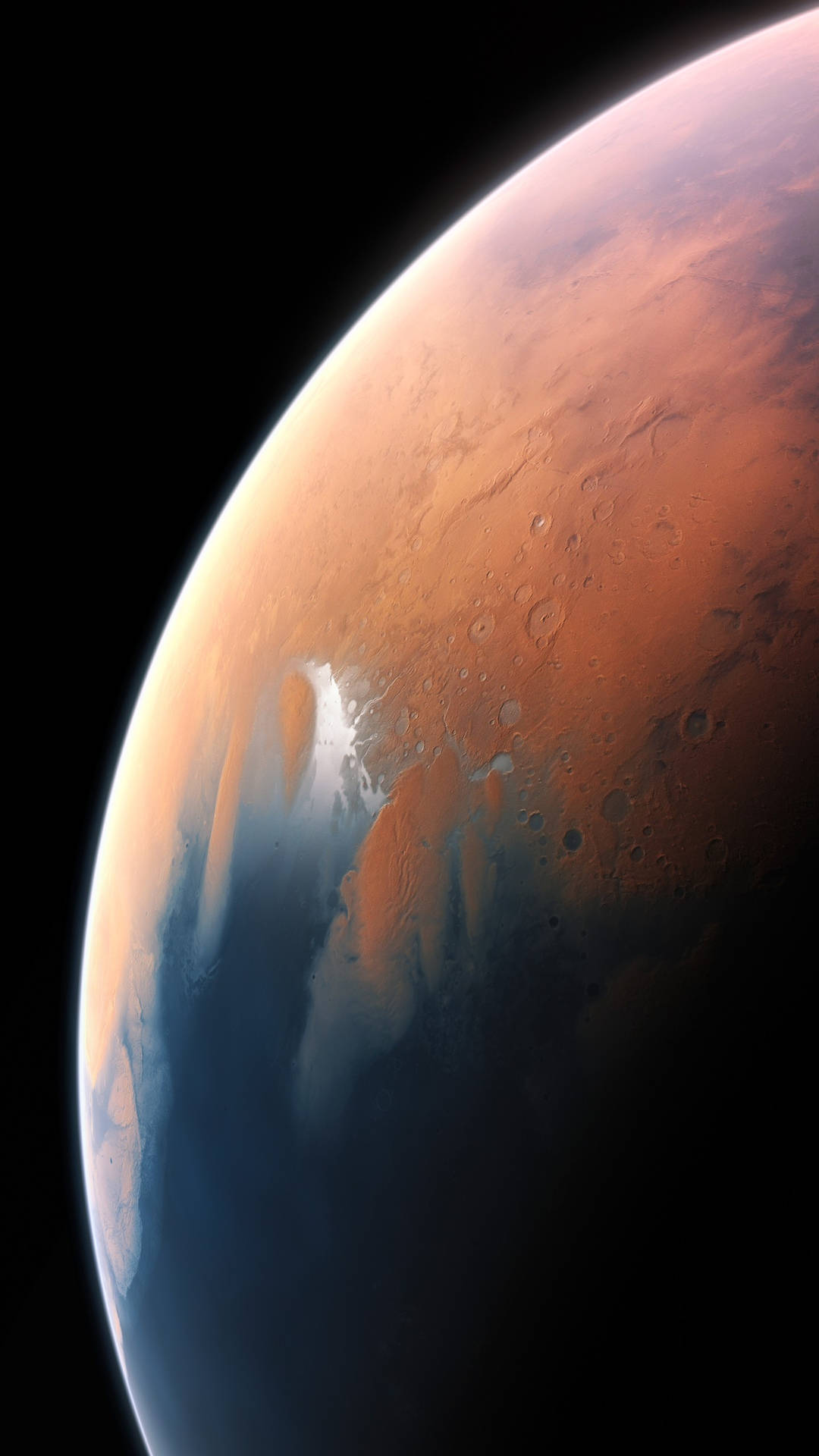 太空中帶有鏽色表面和極地冰蓋的火星。