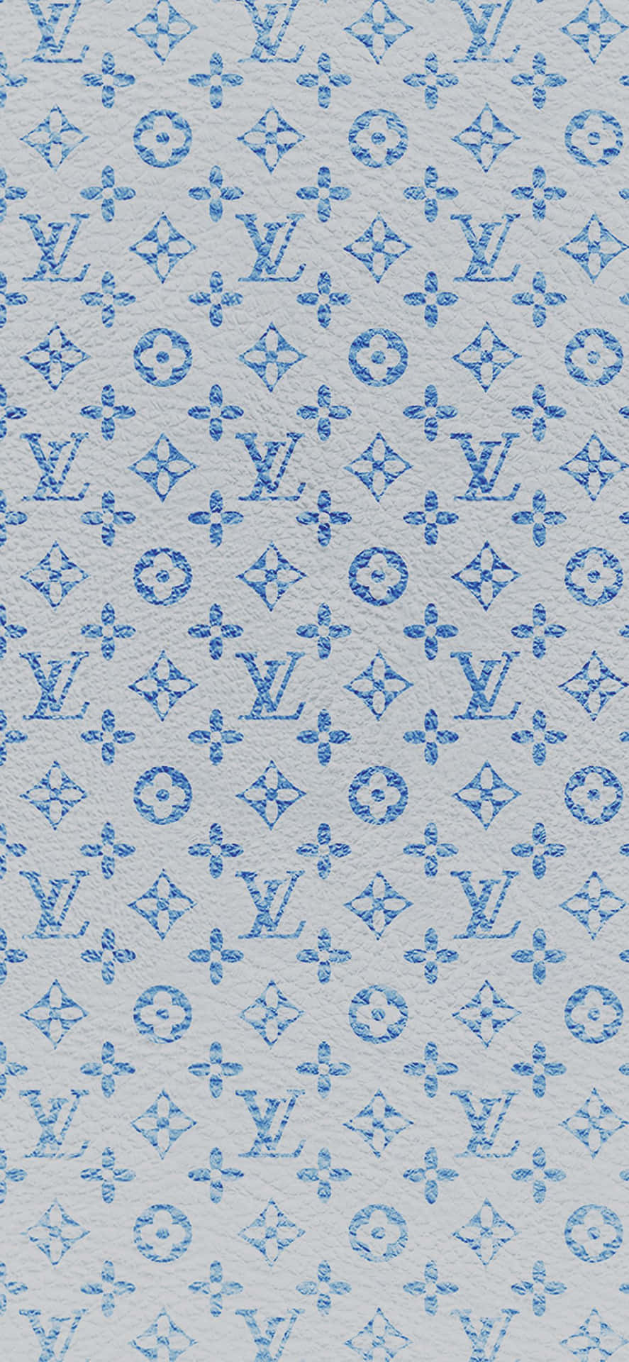 在帶有紋理的灰色布料上的藍色 Louis Vuitton 字母組合圖案。