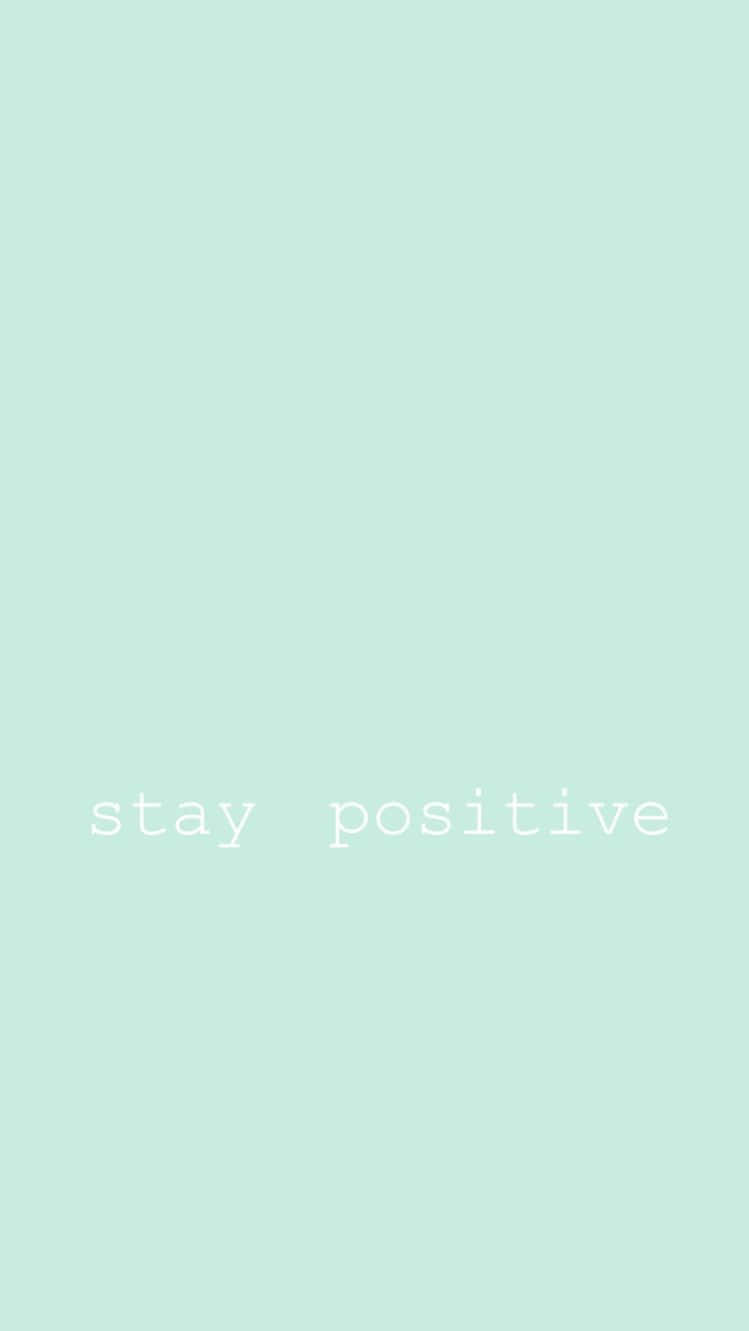 薄荷綠色背景，白色文字寫著 stay positive