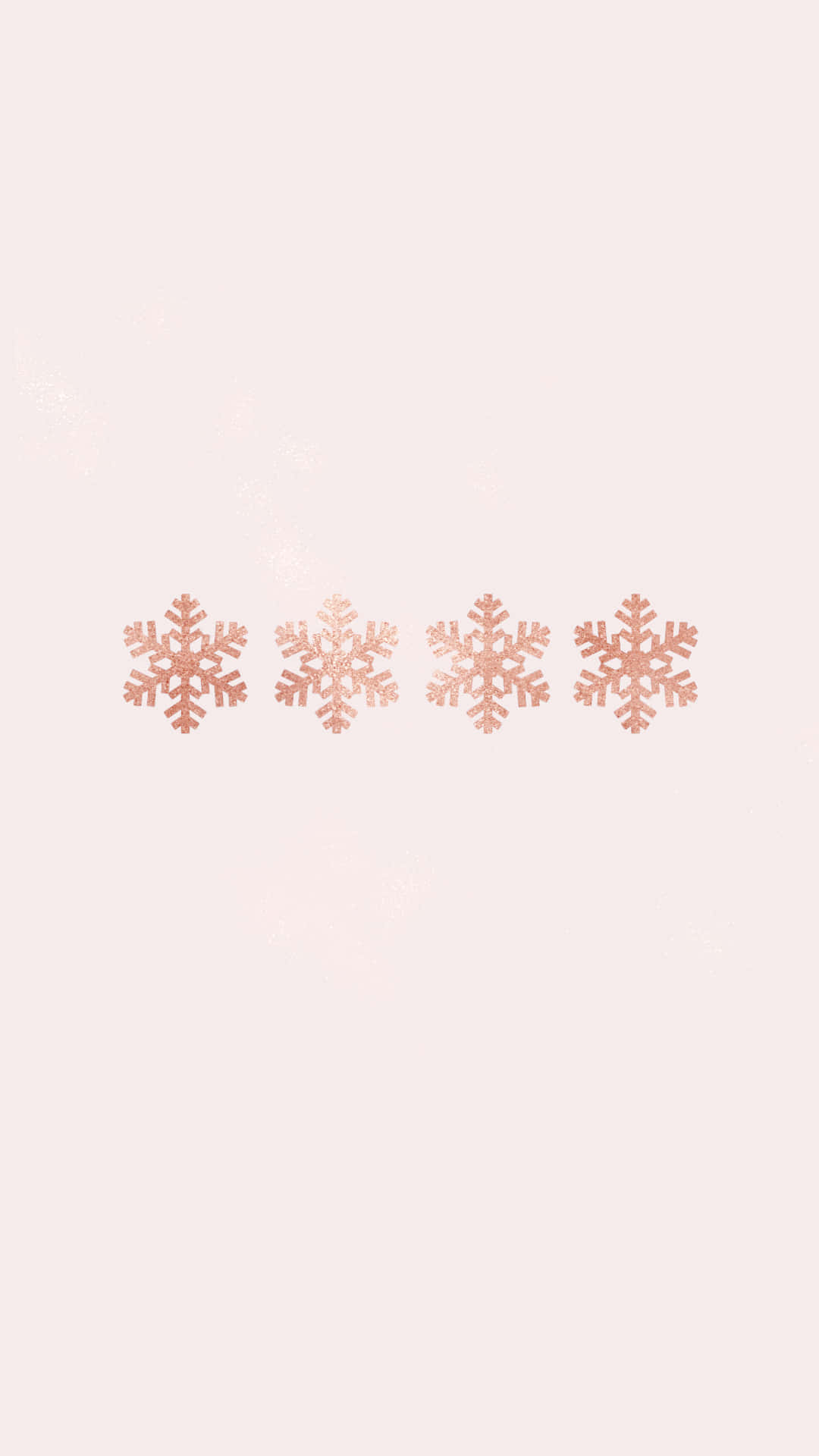 四片玫瑰金色雪花在柔和的淡粉紅背景上飄浮，帶有微妙的閃爍效果。