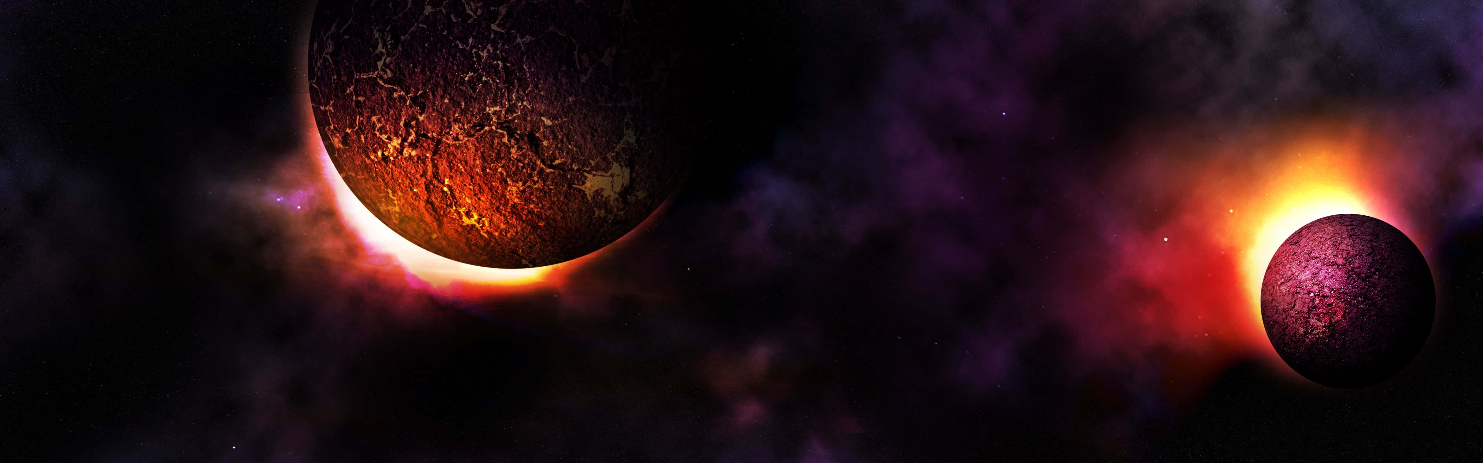 兩顆裂開的行星在色彩繽紛的星雲中圍繞一顆發光的恆星運行。
