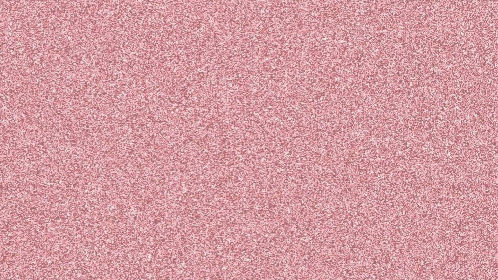 以閃粉玫瑰金展現耀眼風采 壁紙 — 柔和的粉紅色閃粉質感，散落著白色閃光，營造出閃爍的抽象背景。