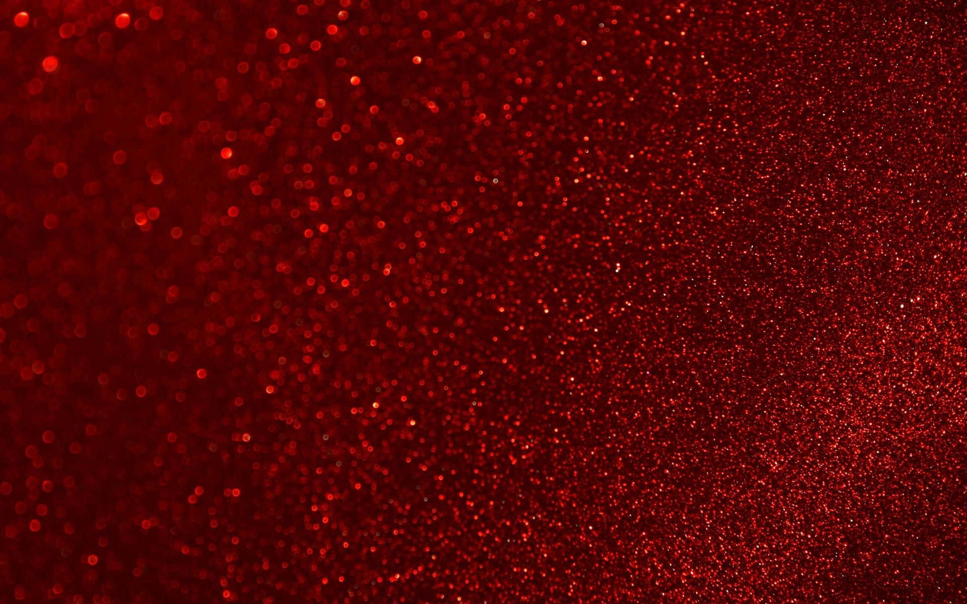 帶有閃爍散景高光的豐富紅色閃粉紋理。