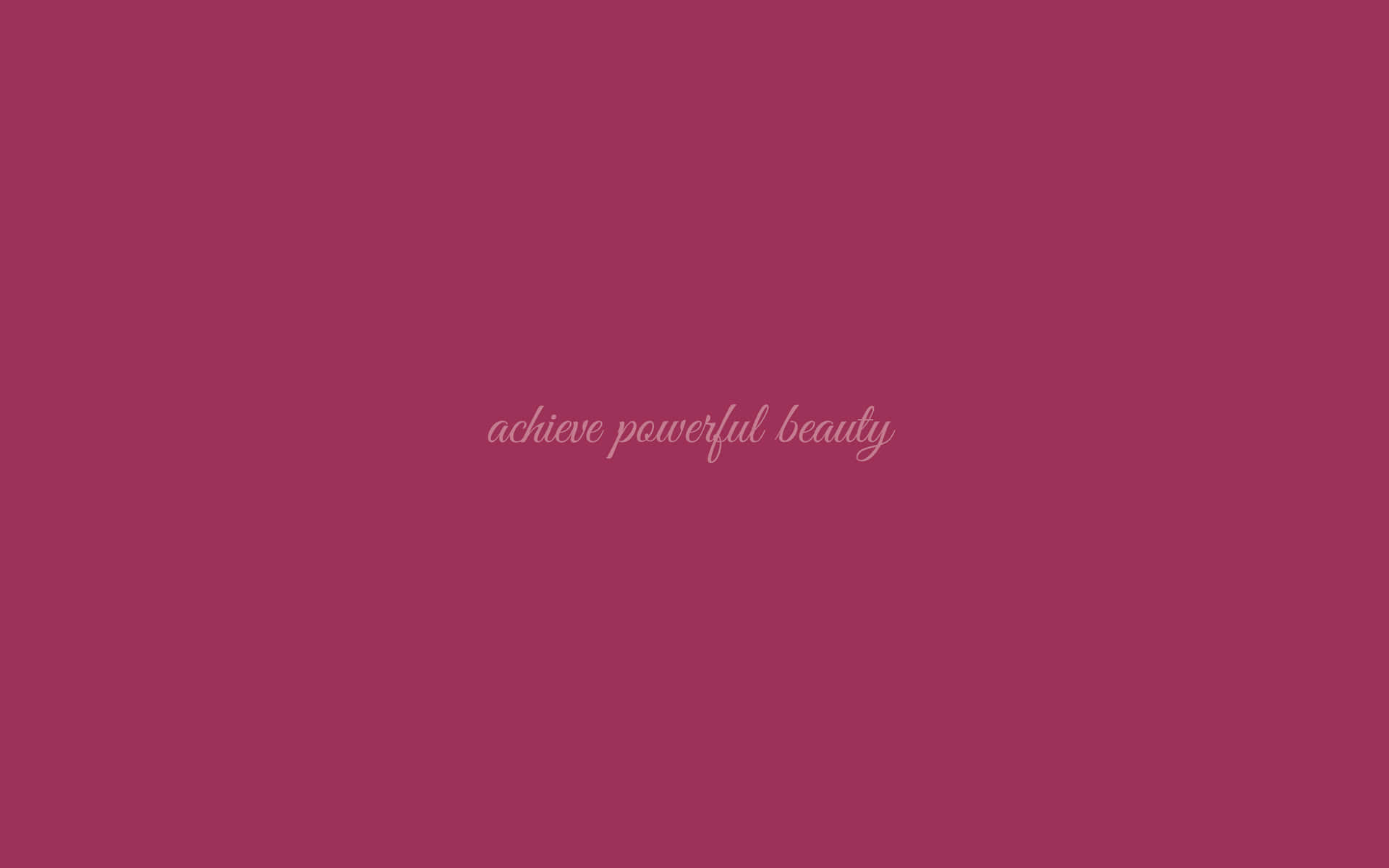 洋紅色背景中央有草書文字 achieve powerful beauty