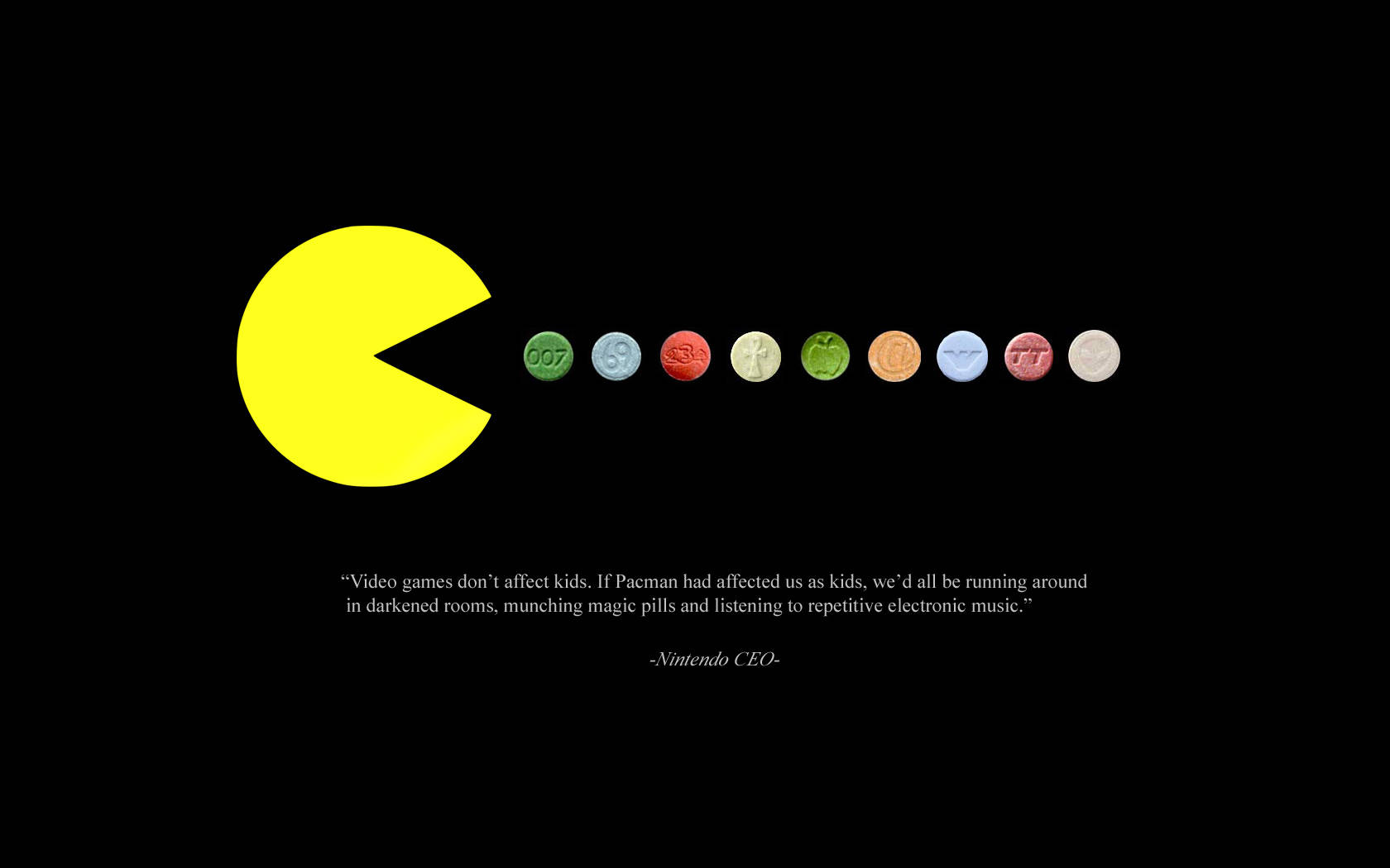 任天堂的電子遊戲觀點 壁紙 — 一個明亮的黃色 Pacman 角色面對一排彩色藥丸，背景為黑色，下方有任天堂 CEO 的語錄。
