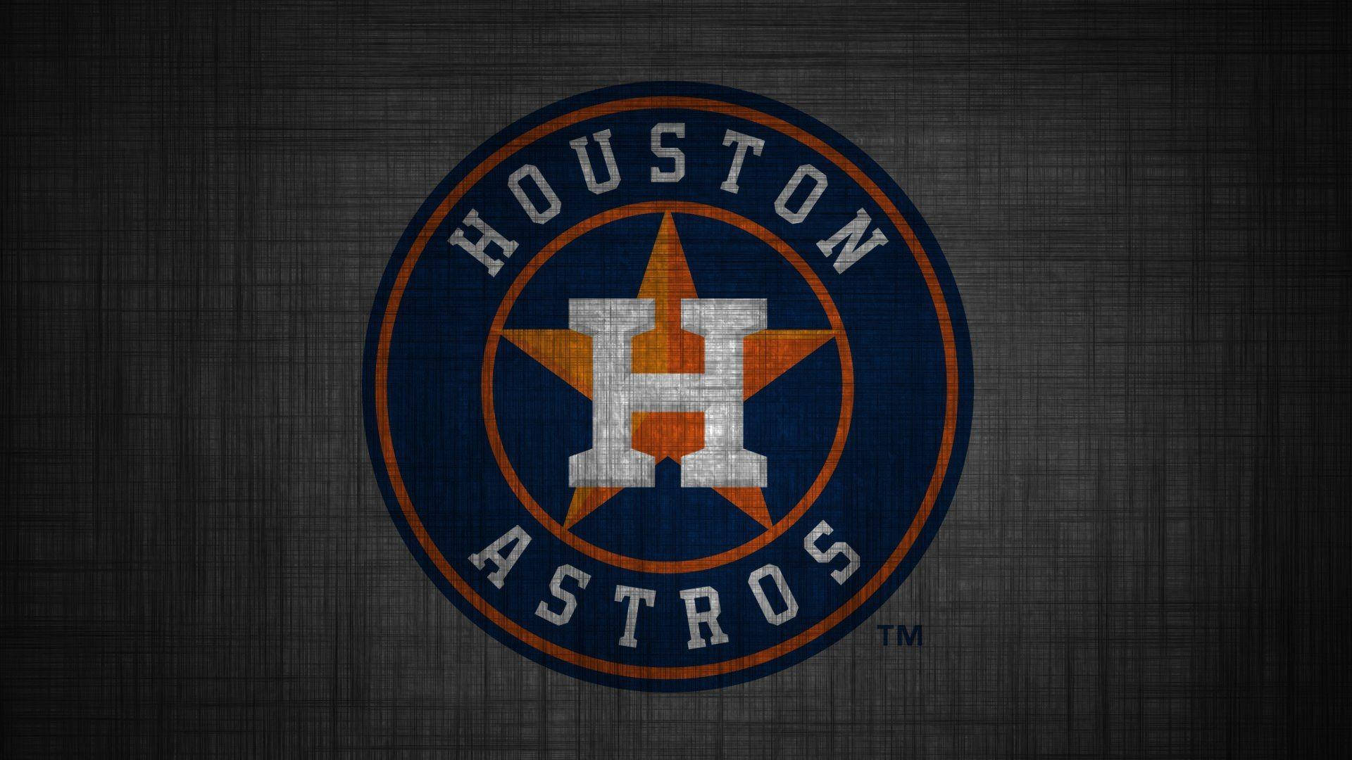休斯敦太空人隊紋理標誌 壁紙 — Houston Astros 標誌，帶有磨損紋理，深灰色布料背景。