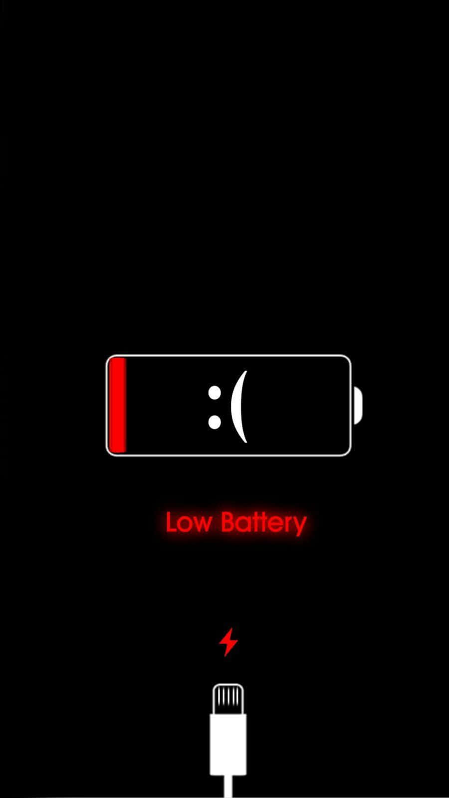 低電量與哀傷圖示 壁紙 — 黑色背景上帶有悲傷表情和充電線的低電量圖標。
