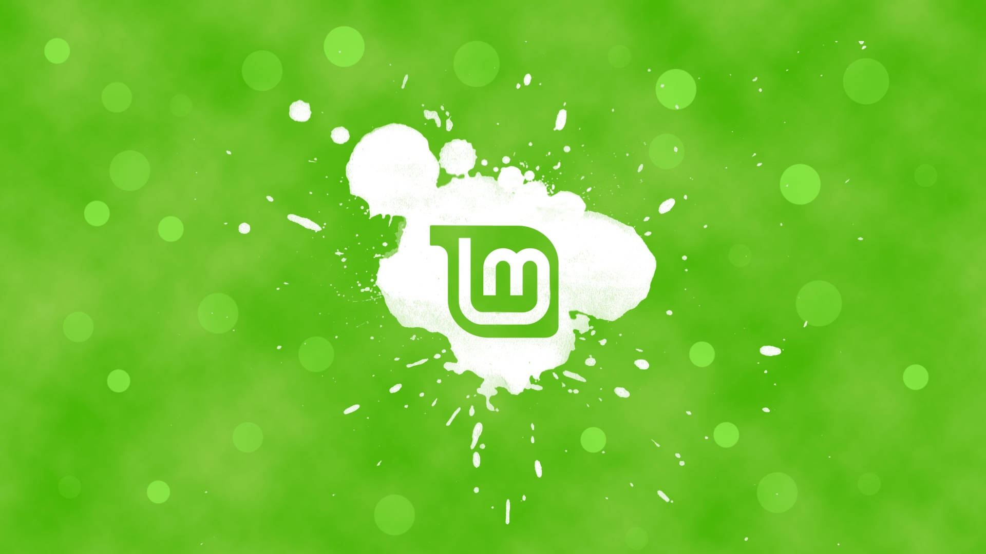 作業系統Linux Mint綠色主題標誌 壁紙 — 充滿活力的綠色背景，白色油漆飛濺露出中央的綠色標誌。