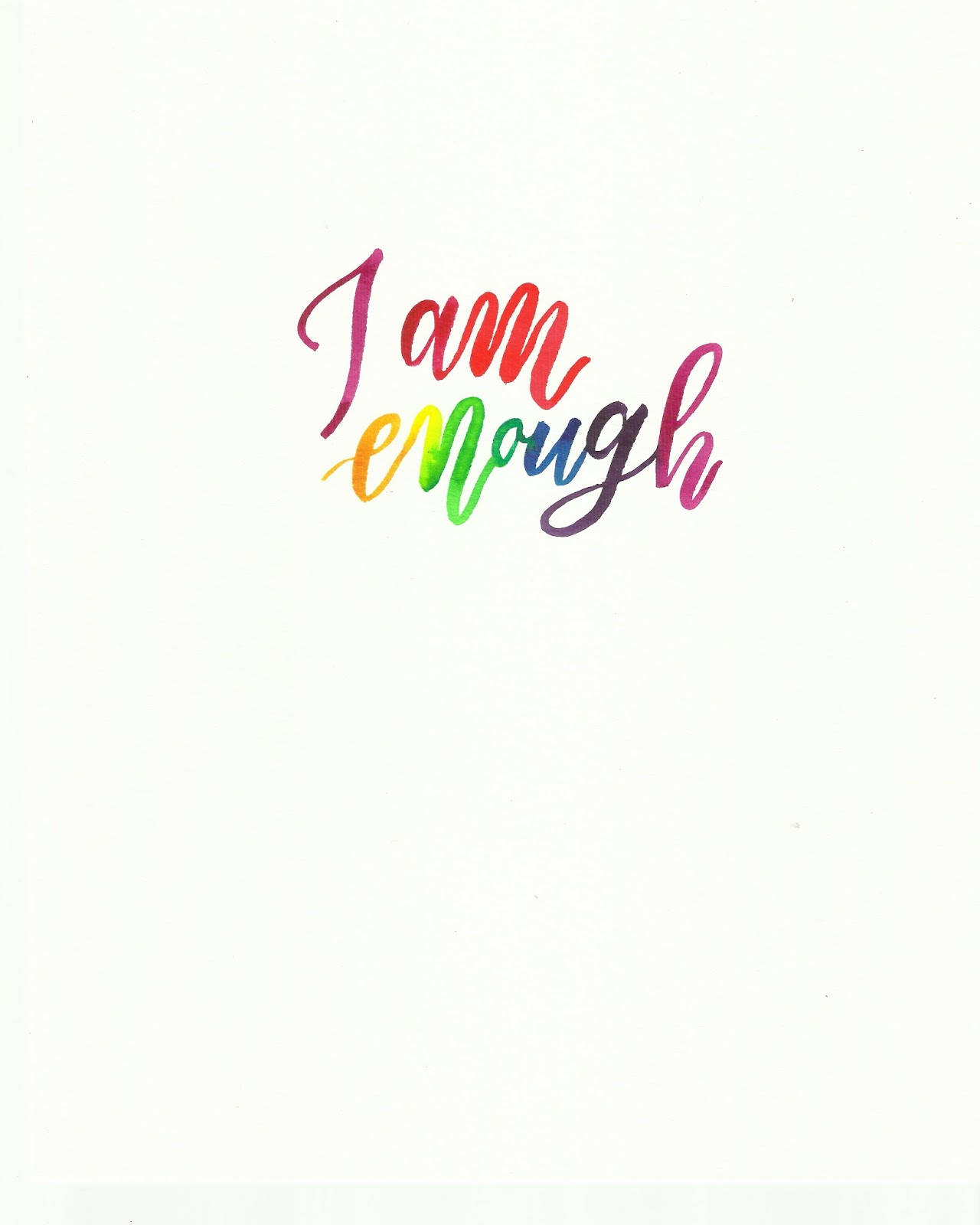 白色背景上以彩虹色手寫的「I am enough」字句。
