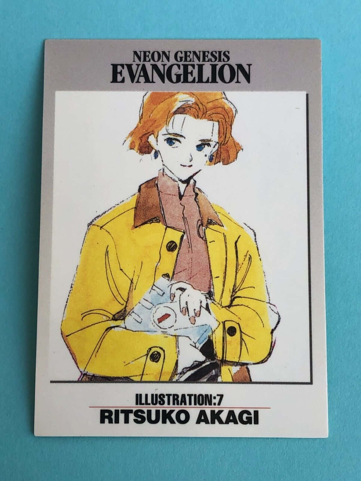 Ritsuko Akagi 桌布 壁紙 — 來自《新世紀福音戰士》的赤木律子角色插圖，身穿黃色外套並手持裝置。