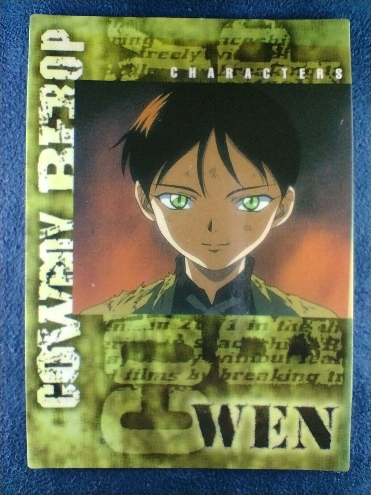 Cowboy Bebop Wen 桌布 壁紙 — 來自《星際牛仔》的動漫角色 Gwen，擁有綠色眼睛和黑色頭髮，背景是火熱的橙色。