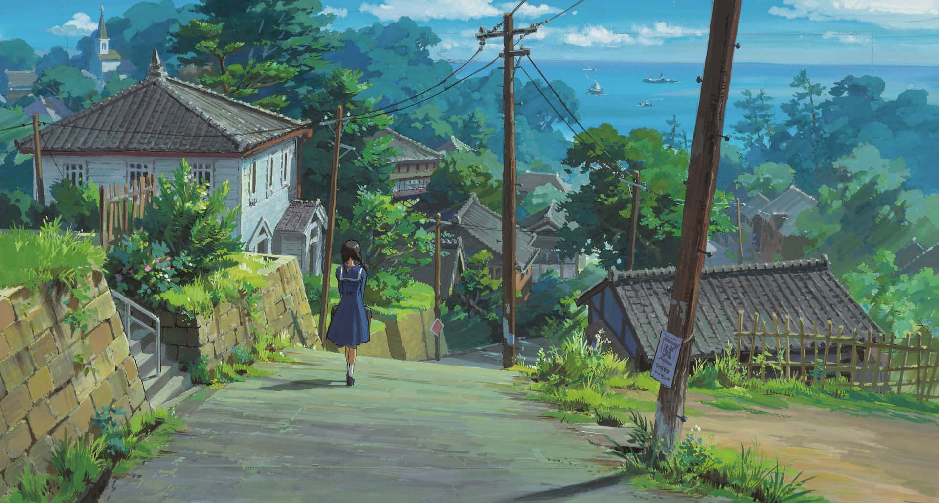 藍裙女孩沿著沿海村莊道路走向海洋。