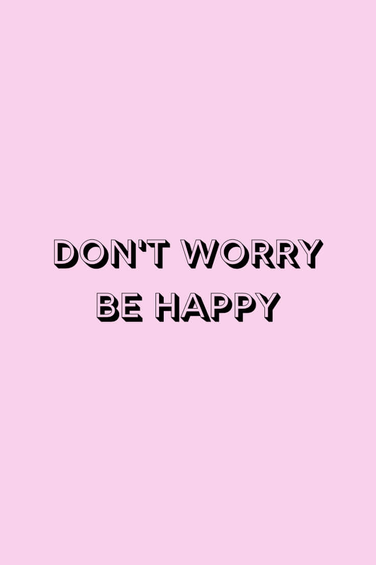 粉紅背景上帶有粗體黑色勵志文字 'DON'T WORRY BE HAPPY'。