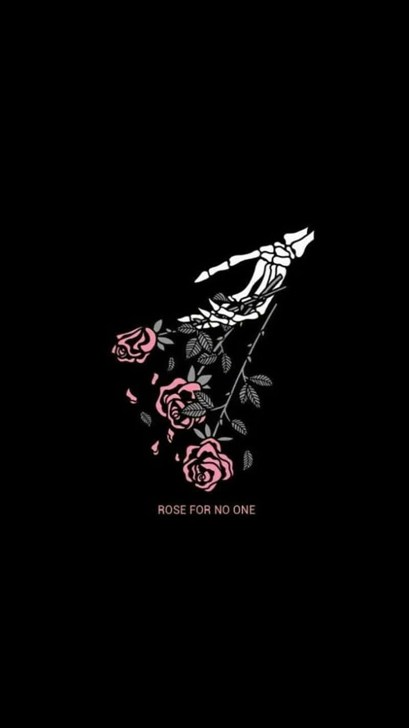 骷髏手拿著粉紅玫瑰，附有文字 rose for no one