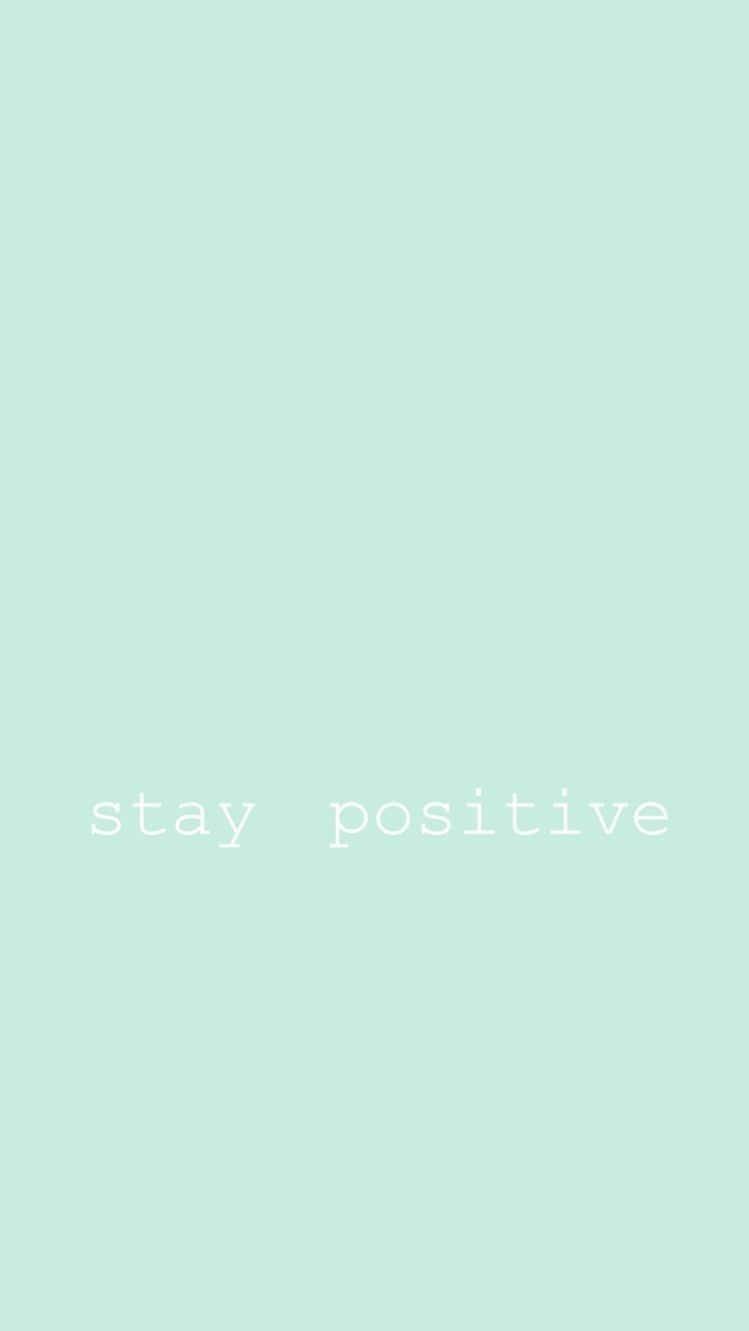 薄荷綠色背景，白色文字寫著 stay positive