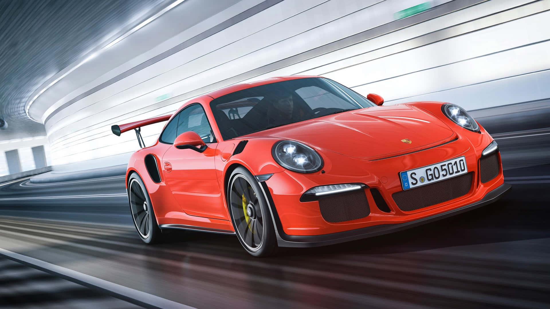 紅色保時捷911 GT2 RS在彎曲隧道中疾馳，呈現模糊動態。
