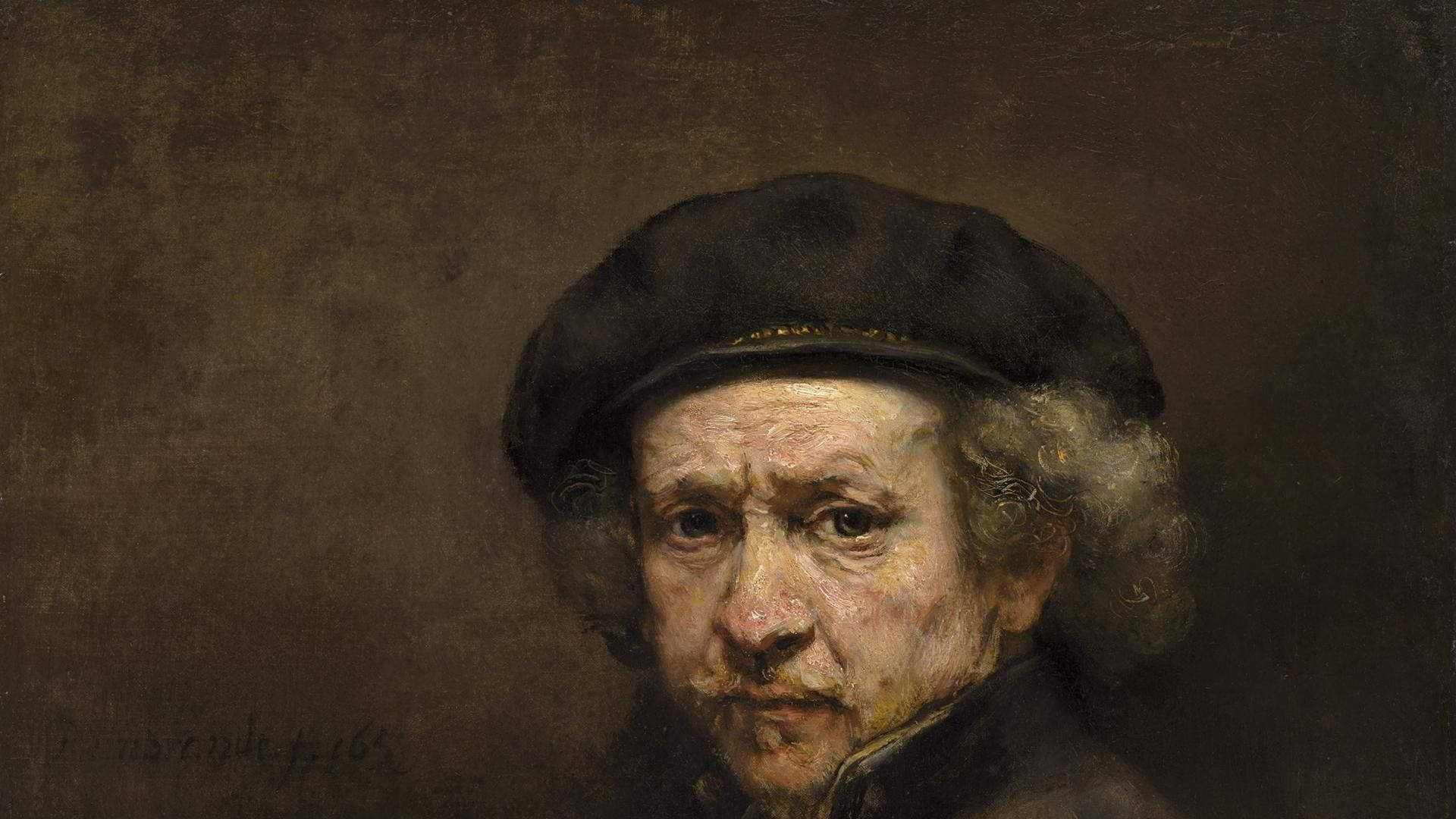 倫勃朗·范·萊因 1659 年自畫像 壁紙 — 一位長者嘅特寫肖像，佢有灰色曲髮同戴住黑色帽，用豐富、有質感嘅油畫技法繪製，配合強烈嘅明暗對比燈光。