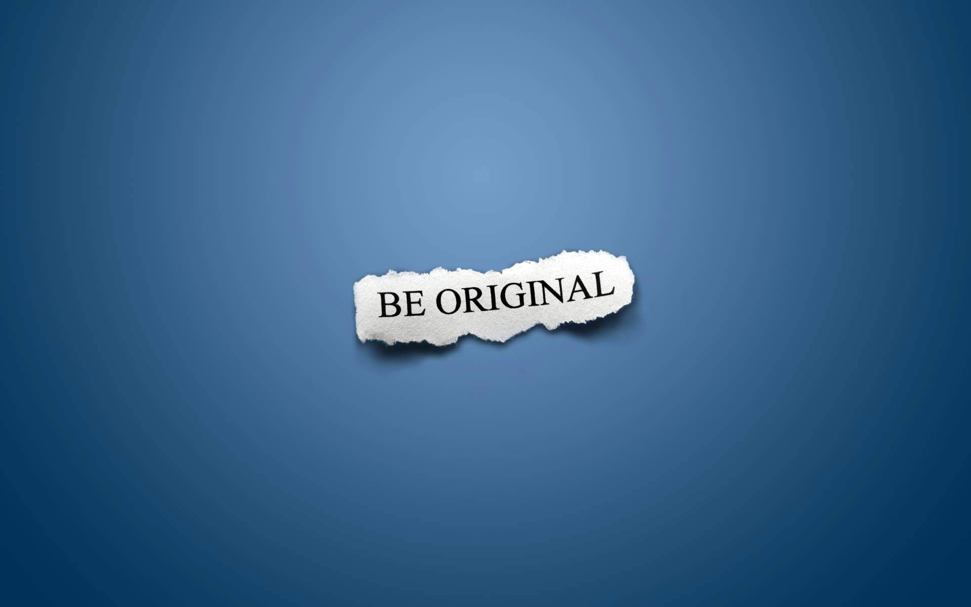 撕裂的紙張，上面有「BE ORIGINAL」文字，背景為藍色漸變。