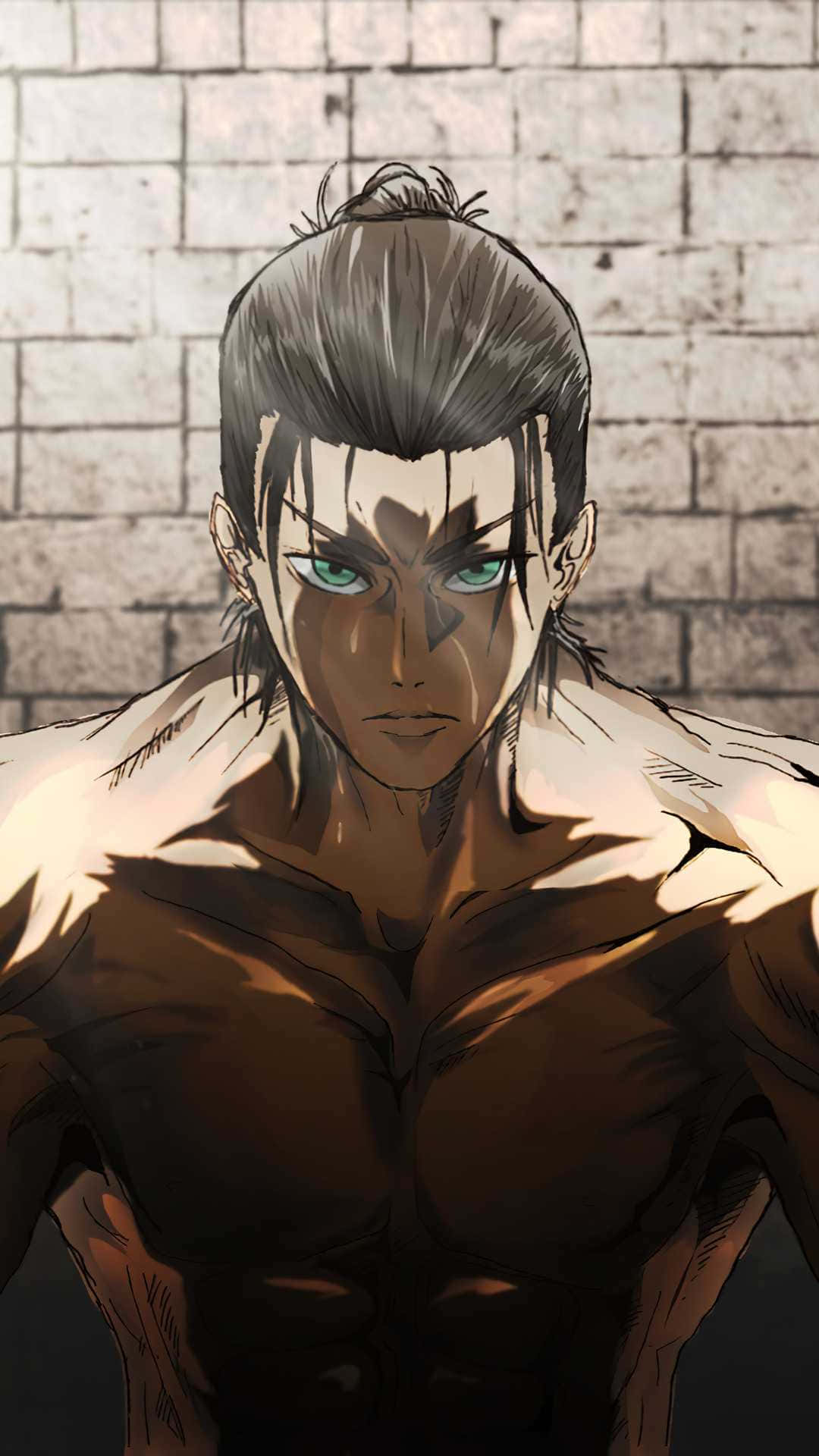 健壯艾倫耶格爾頭像 壁紙 — 一個肌肉發達的動漫男人，綠色眼睛，頭髮向後紮起，在戲劇性的燈光下站在風化的磚牆前。