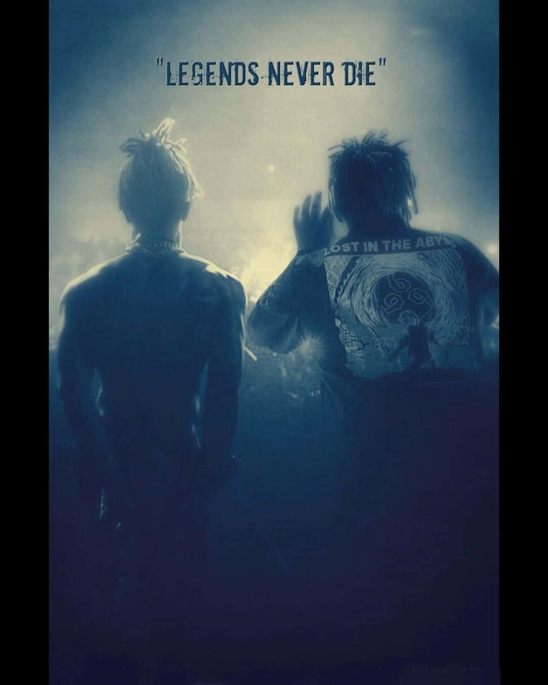 兩個剪影人物，上方有發光的文字 legends never die。