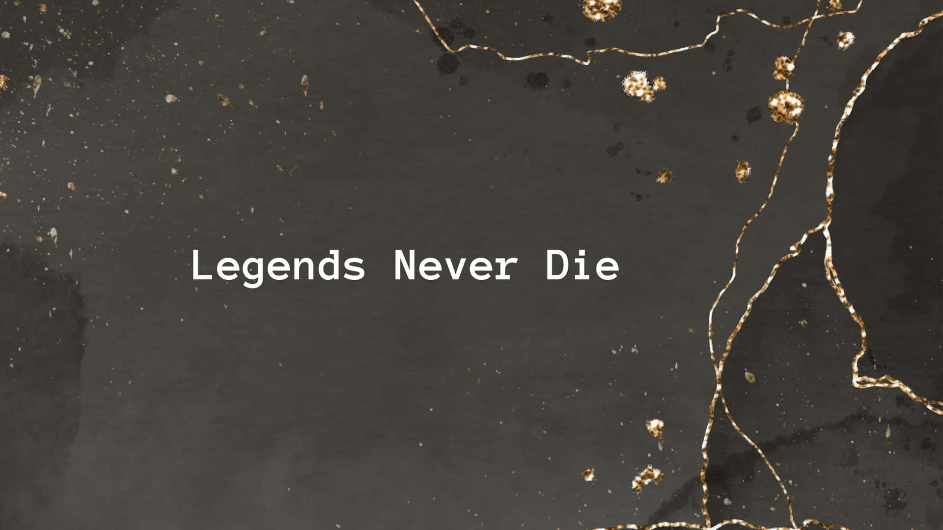 文字桌布，寫著 Legends Never Die，黑色背景上有金色裂紋