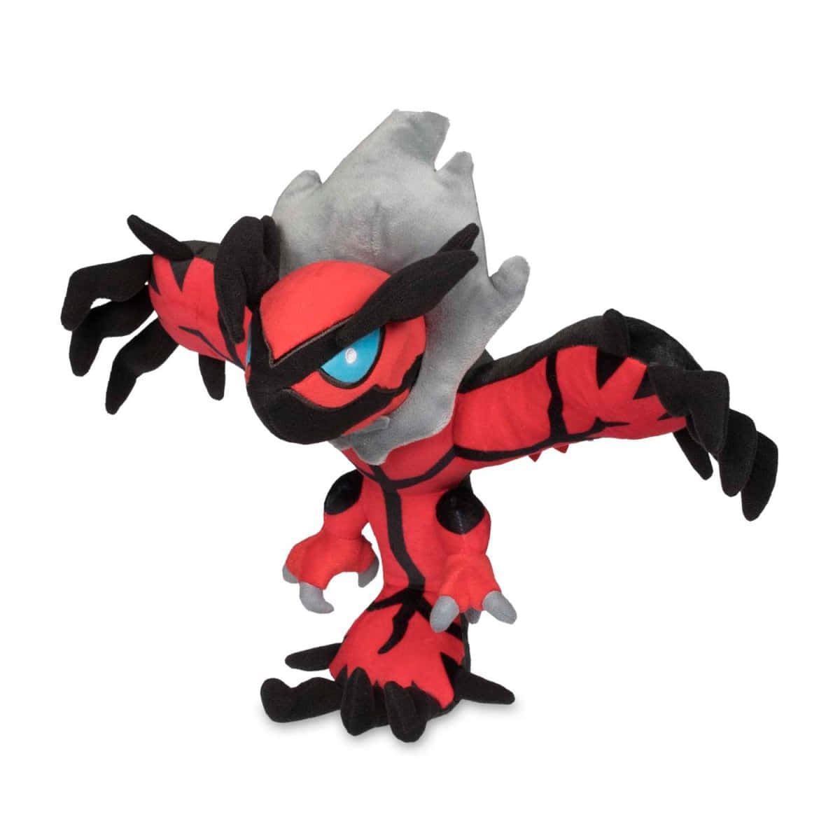 傳說寶可夢 Yveltal 毛絨玩具 壁紙 — 一隻紅色、黑色和灰色的 Pokémon 索羅亞克毛絨玩具，藍色眼睛，在白色背景前動態擺姿勢。