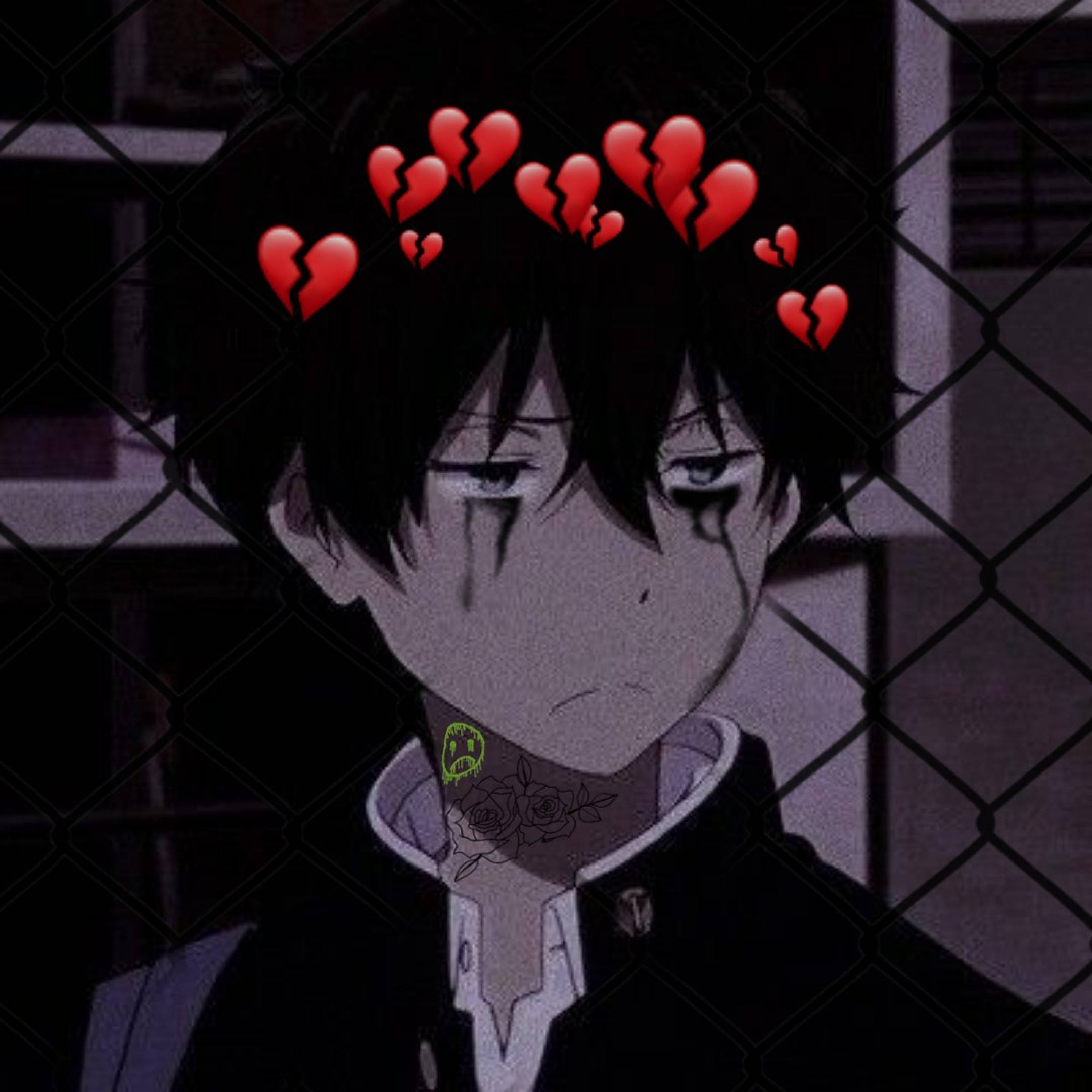 傷心男孩動漫頭像 壁紙 — 一個悲傷的動漫男孩，眼淚和破碎的心漂浮在他的頭頂，身後是鐵絲網圍欄。
