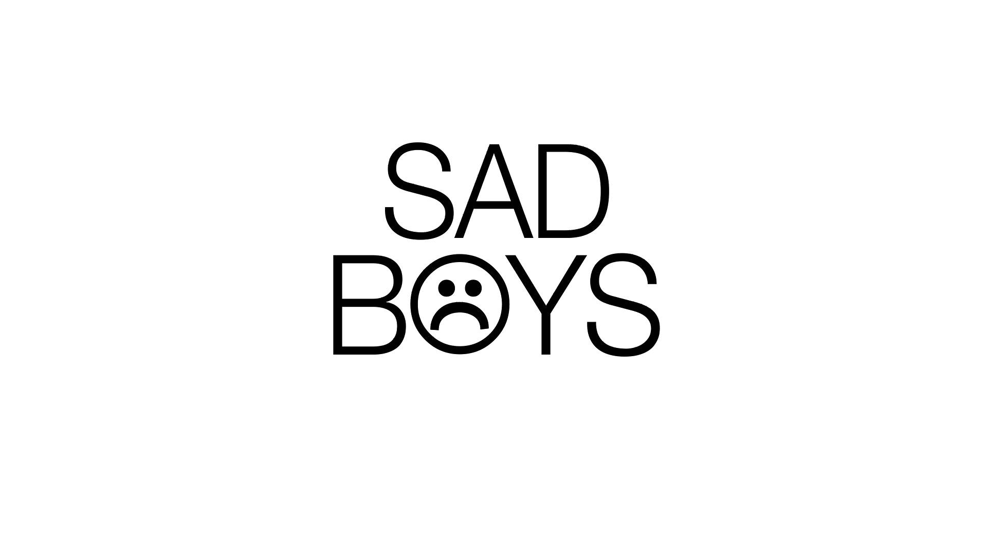 傷心男孩字體與圖示 壁紙 — 粗體黑色文字寫著「SAD BOYS」，其中「O」被一個皺眉表情取代，背景為純白色。