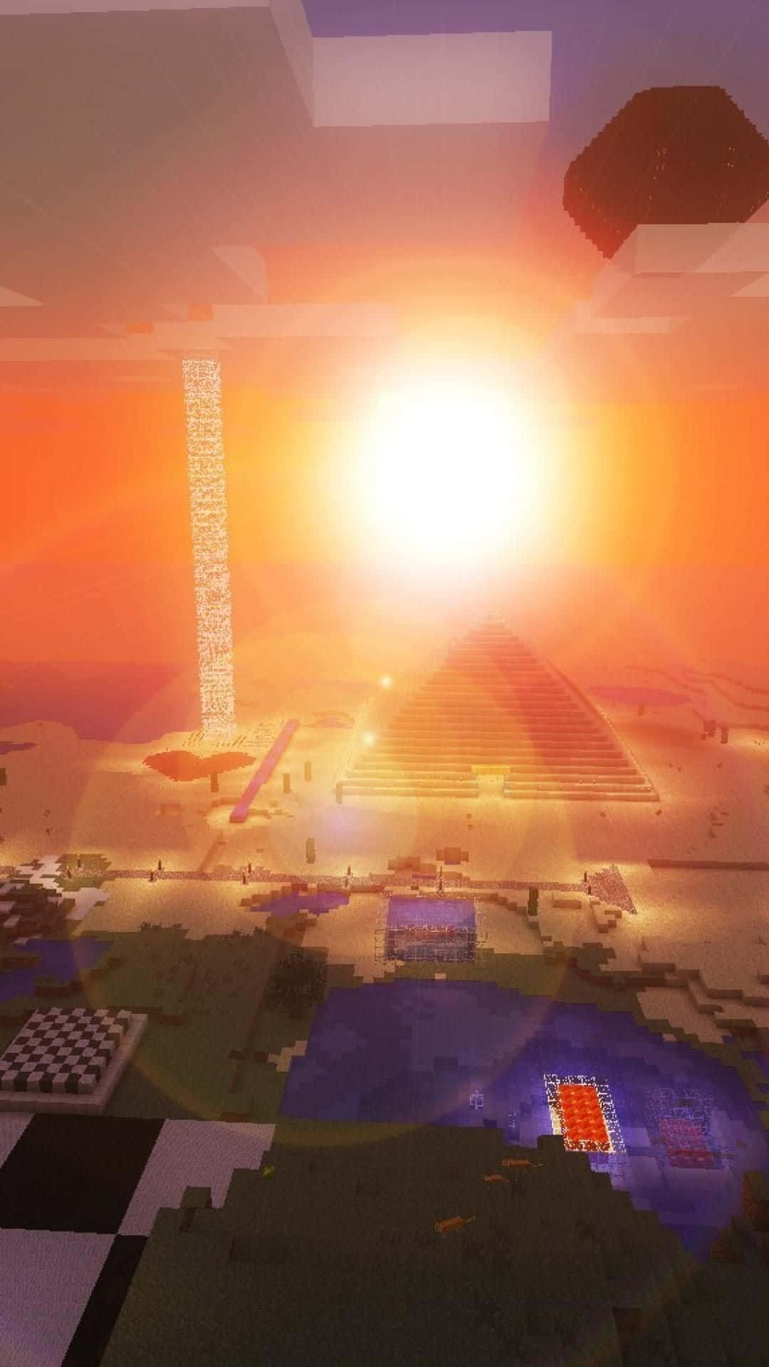 Minecraft Phone 桌布 壁紙 — 像素化的Minecraft日落，沙漠上有金字塔在溫暖的橙色光芒中閃耀。