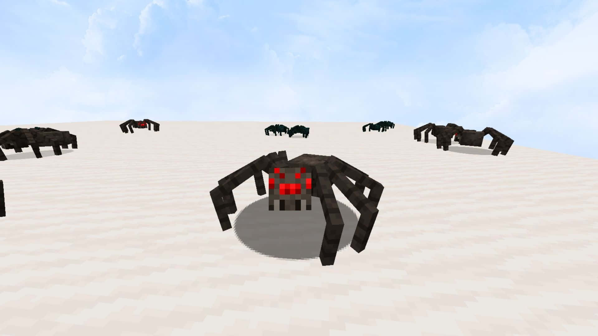Minecraft Spider 桌布 壁紙 — 像素化的黑色蜘蛛，帶有發光的紅色眼睛，站在沙質平原上，頭頂是明亮的藍天。