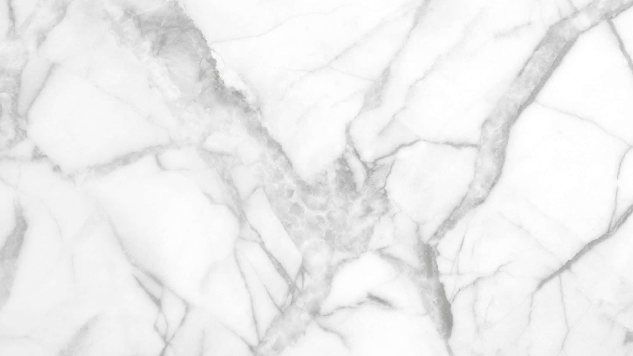 Grey Marble 桌布 壁紙 — 優雅白色大理石的特寫，帶有複雜的灰色紋理圖案。