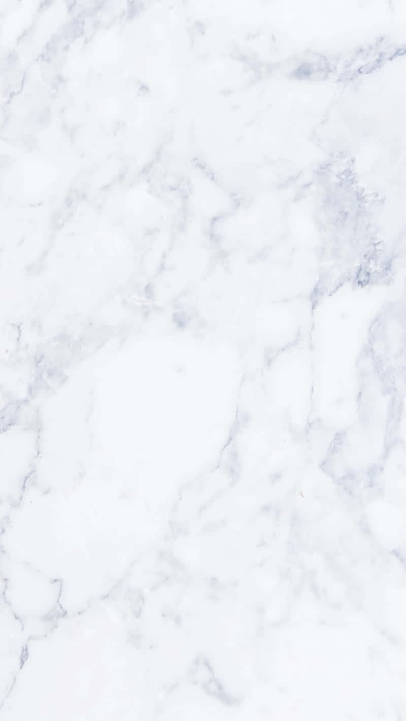 Marble Phone 桌布 壁紙 — 優雅白色大理石的近距離特寫，帶有柔和灰色紋理，營造出奢華的自然圖案。