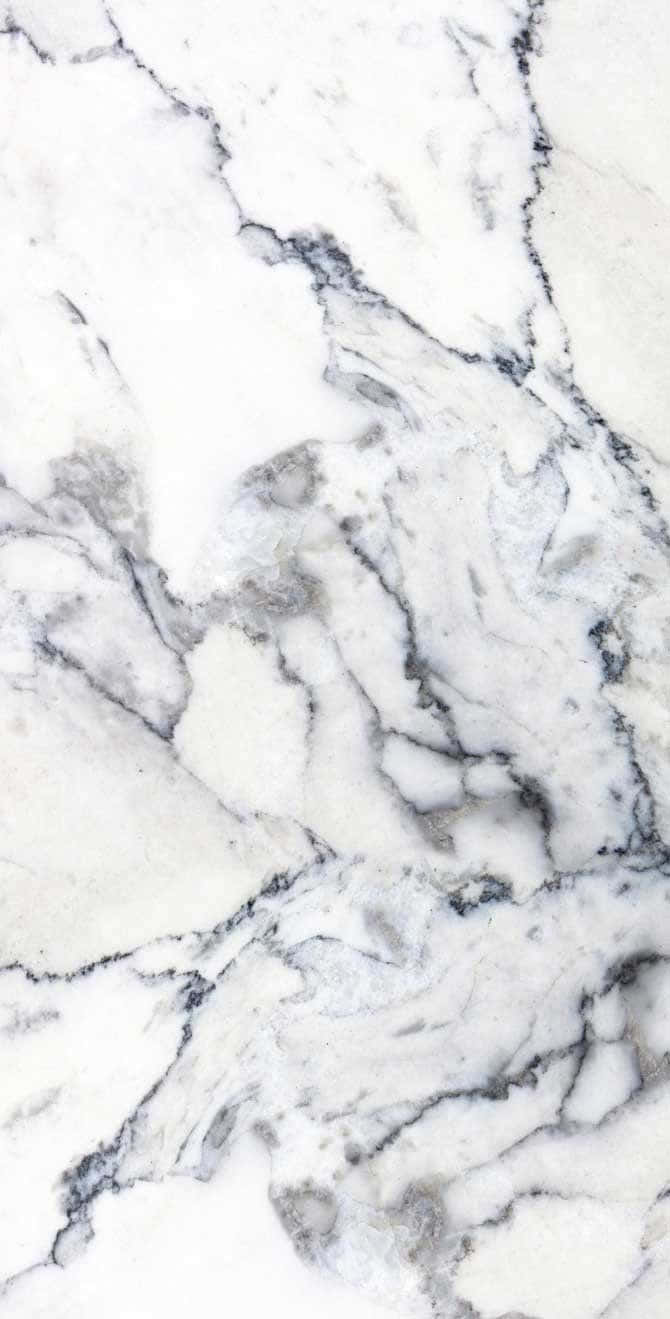 Marble Phone 桌布 壁紙 — 優雅白色大理石的近距離特寫，表面流動著複雜的灰色紋理。