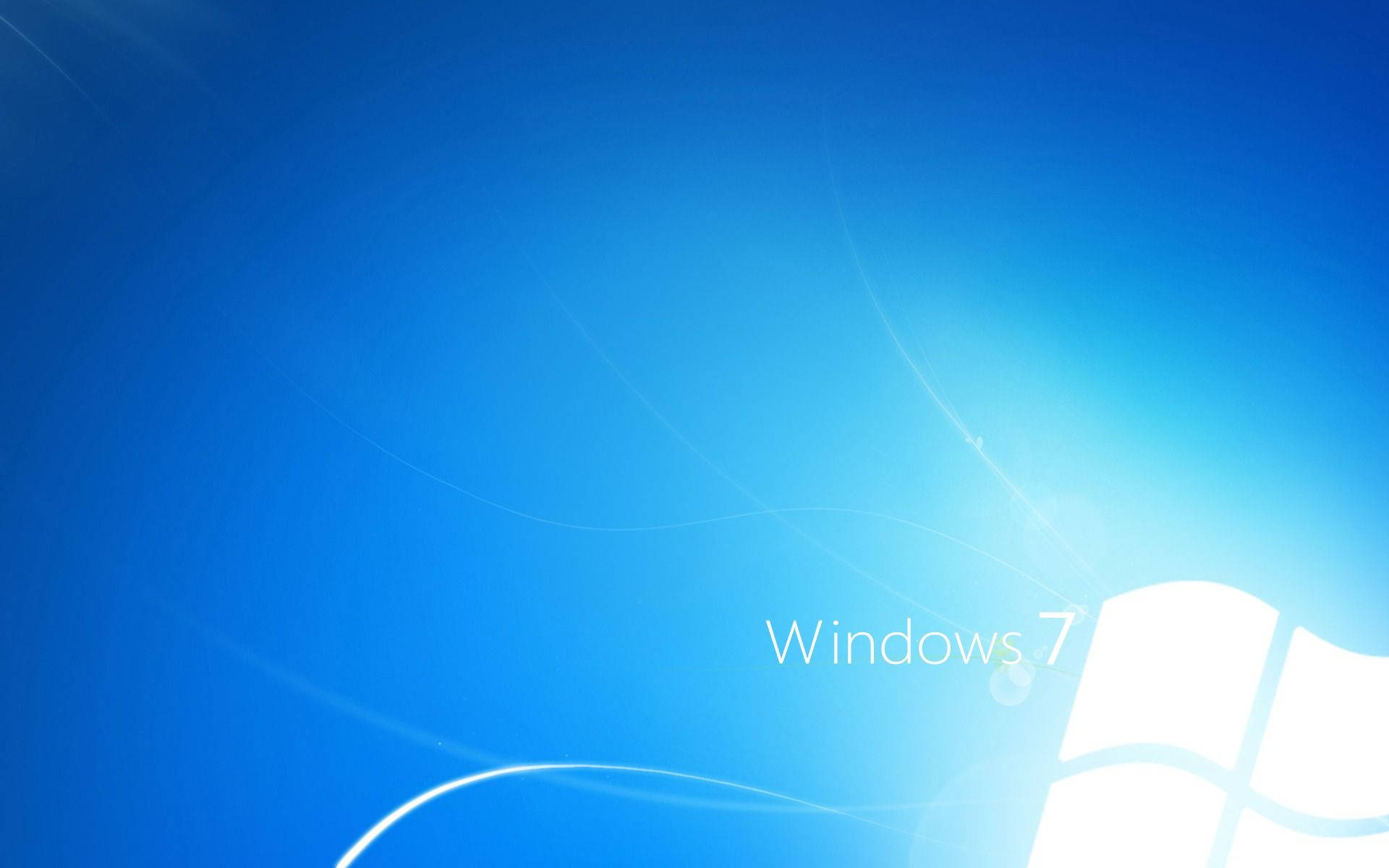 Windows 7 操作系統標誌在藍色漸變背景上，帶有發光的漩渦。