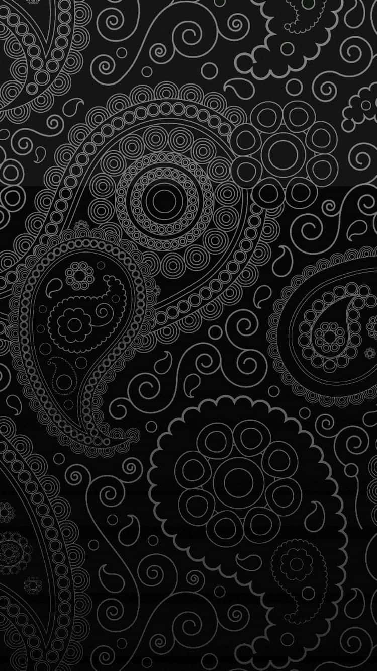 Paisley 桌布 壁紙 — 優雅的白色佩斯利圖案在深黑色背景上以重複的裝飾設計旋轉。