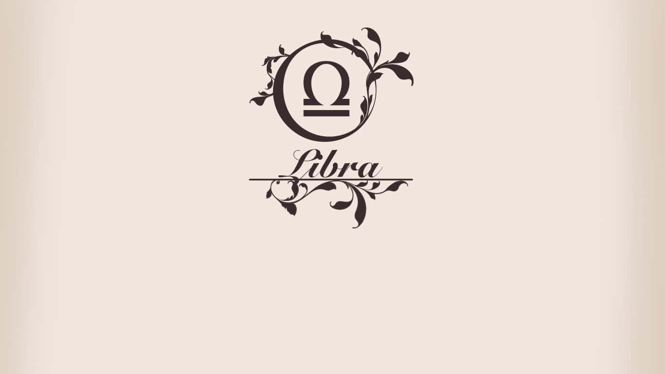 libra 桌布 壁紙 — 優雅的黑色天秤座星座符號，飾以華麗藤蔓和字體，置於柔和米色背景上。