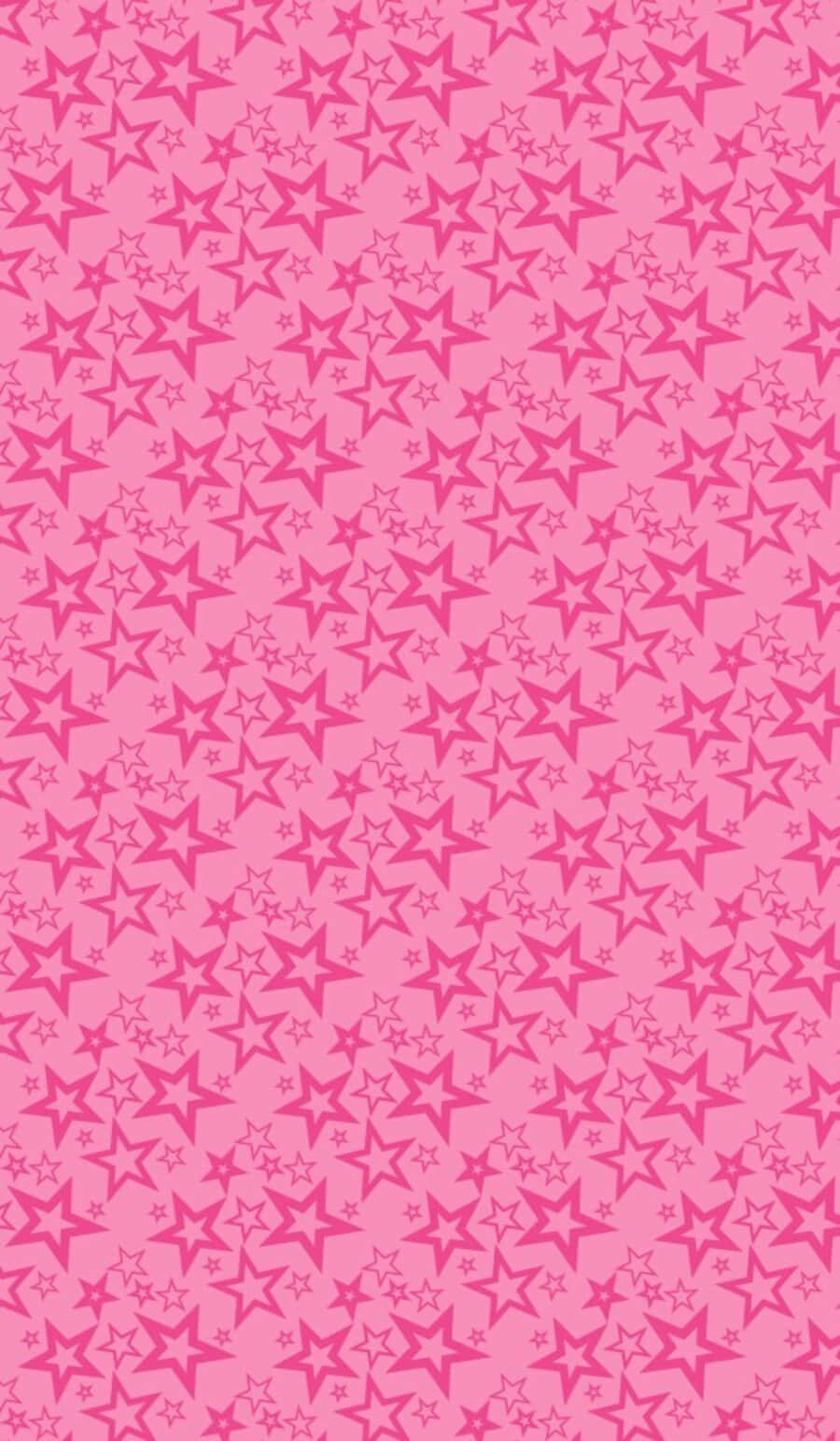 Pink Stars 桌布 壁紙 — 充滿不同深淺散落星星形狀的鮮豔粉紅色牆紙，營造出俏皮圖案。