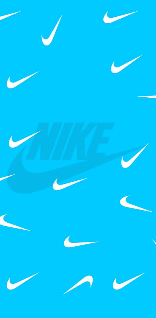 Blue Nike 桌布 壁紙 — 充滿散落白色Nike swoosh標誌和中央褪色Nike標誌的鮮豔藍色壁紙。
